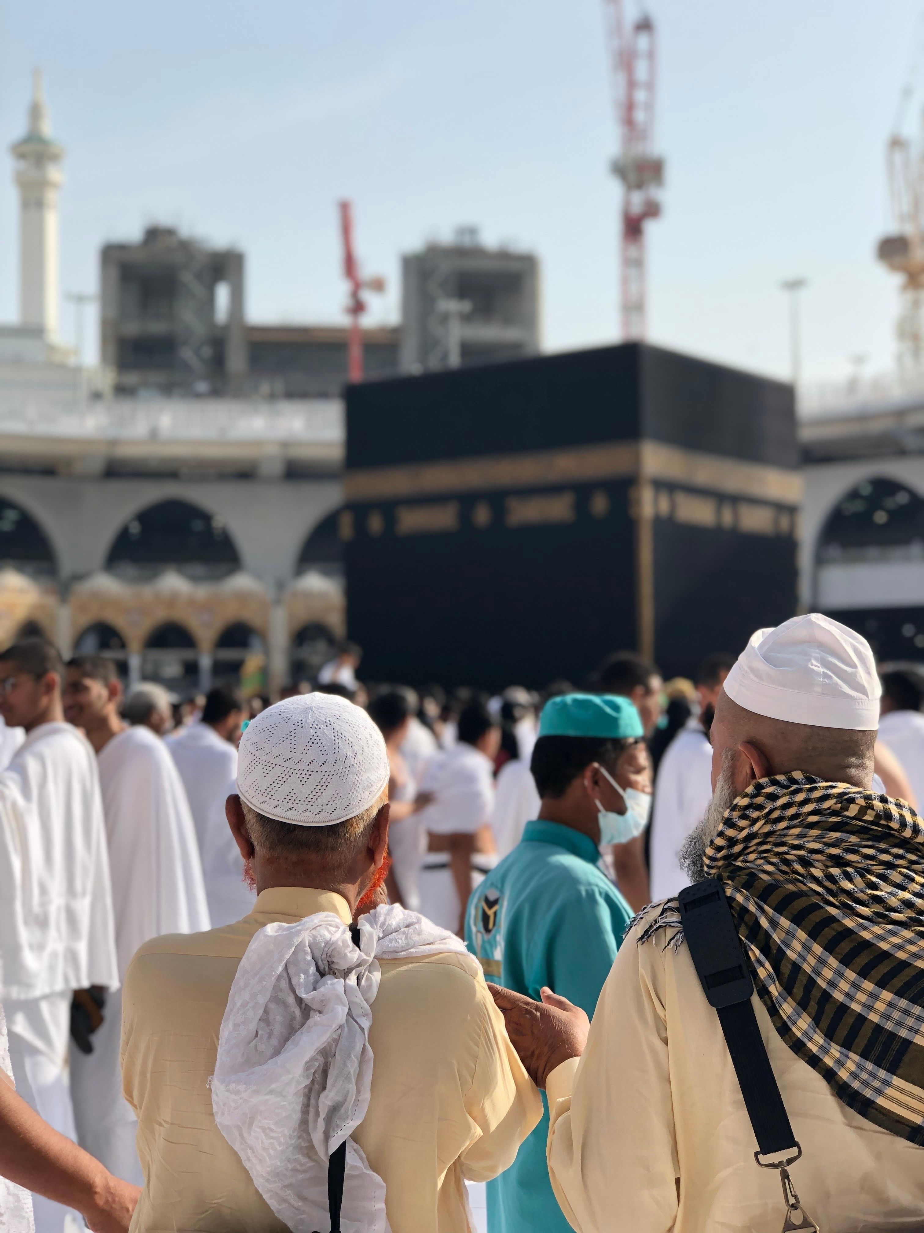 Pilgrims preparing for Umrah near the Kaaba